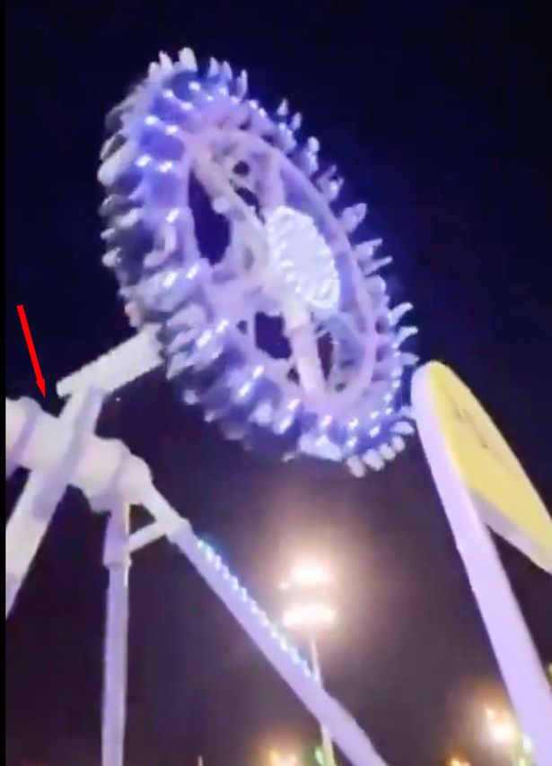 screenshot from a video showing popular Saudi amusement ride snapping in half mid-air, injuring 23.