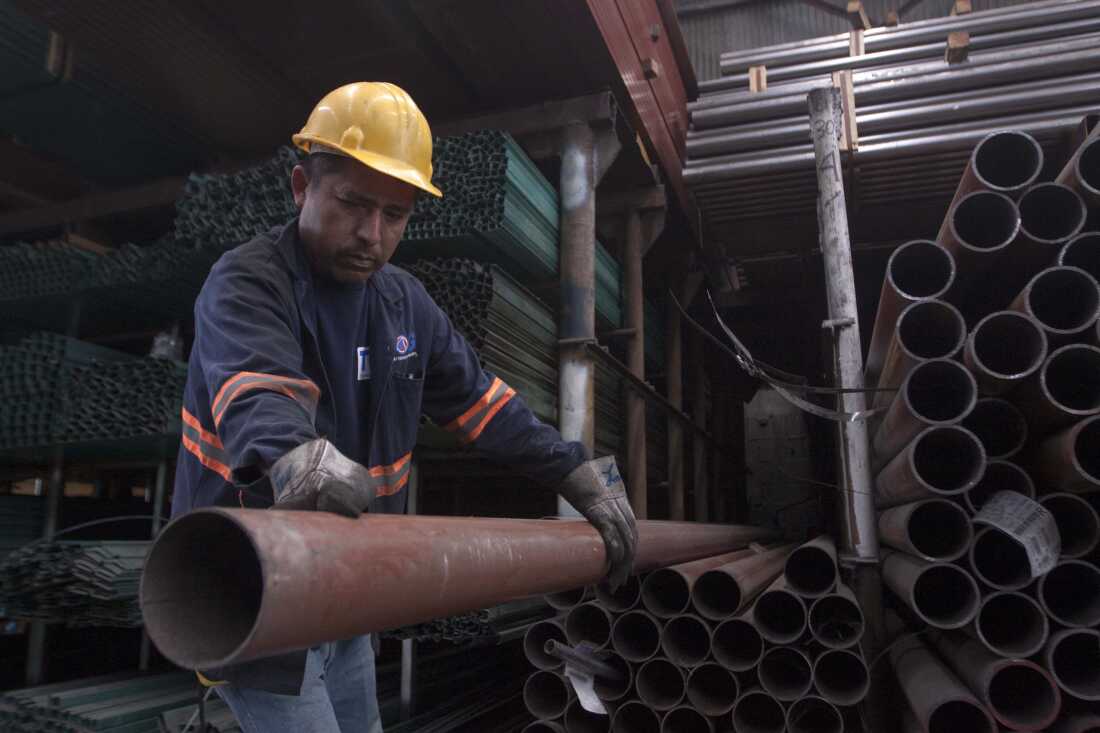 A man works in a steel distribution factory in Monterrey in northern Mexico in May 2018. Mexico announced sweeping retaliatory tariffs on a host of U.S. goods Thursday after the United States slapped steep tariffs on steel and aluminum from Mexico, Canada and the European Union.