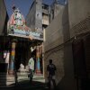 The Chamatkarik Shree Hanumanji Mandir in the old city of Ahmedabad in western India, which is seen by worshippers as a place where prayers to obtain visas to Western countries are answered. On a recent day, men and women, sometimes families, shuffled in to pray, some paying the priest to take their passports to wave before the idol of the beloved Hindu monkey god, Hanuman. The “visa temples” spotlight the difficulties that many Indian nationals face in traveling to the West, and why some pay traffickers to get to the U.S. Diaa Hadid, Ahmedabad, Wednesday, March 19.