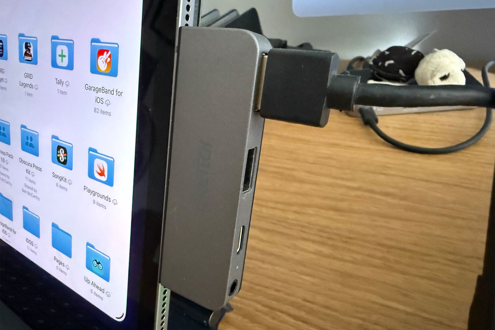 Image may contain Computer Electronics Pc Laptop Adapter Screen Phone Computer Hardware Hardware and Person
