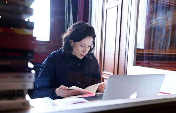Belgian author locks herself in glass room for a book