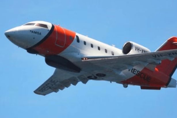 image of a plane in the air [stock]