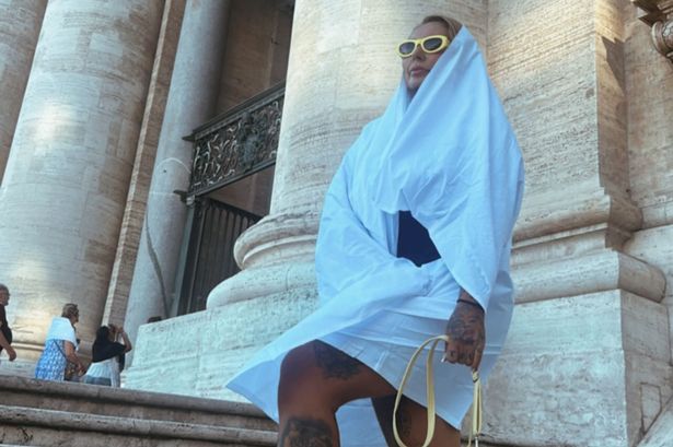 Sabrina Almeida sporting the sheet she says she was told to wear to
