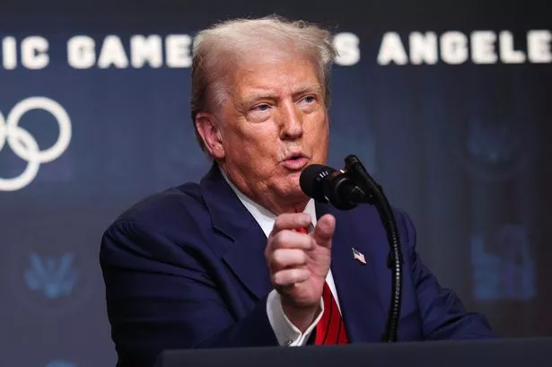 AUGUST 05: U.S. President Donald Trump speaks to reporters after signing an executive order during a ceremony in the South Court Auditorium in the Eisenhower Executive Office Building on August 5, 2025 in Washington, DC