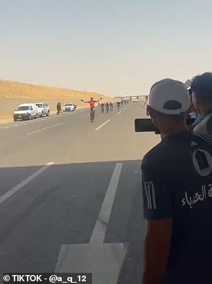 A cocky cyclist suffered instant karma after celebrating what looked like an inevitable race win too early