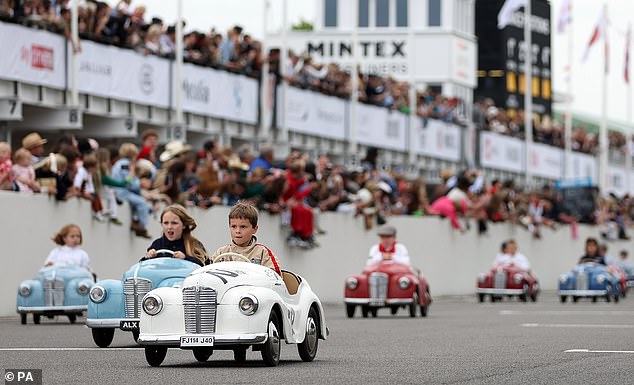 Good little runner: Young racers fighting for pole position at Goodwood Revival