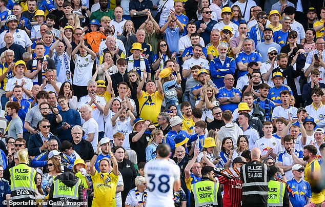 Jack Harrison (38) applauds the Leeds fans in Dublin after Saturday