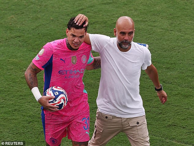 Pep Guardiola (right) wants to keep his long-standing No 1 Ederson at Man City this term