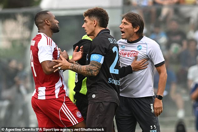 Napoli boss Antonio Conte (right) was not happy with a challenge Ayoub El Kaabi (left)