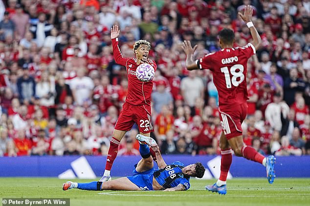Liverpool players were left aggrieved after Marcos Senesi seemingly handled the ball as Hugo Ekitike was through on goal