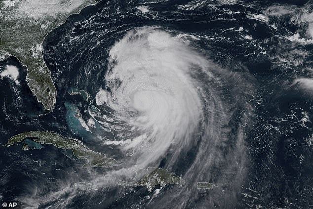 The National Hurricane Center has issued storm warnings in several states as Erin moves north over the Atlantic Ocean
