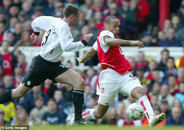 Jamie Carragher has said trying to keep pace with Thierry Henry was like having a foot race with a motorbike