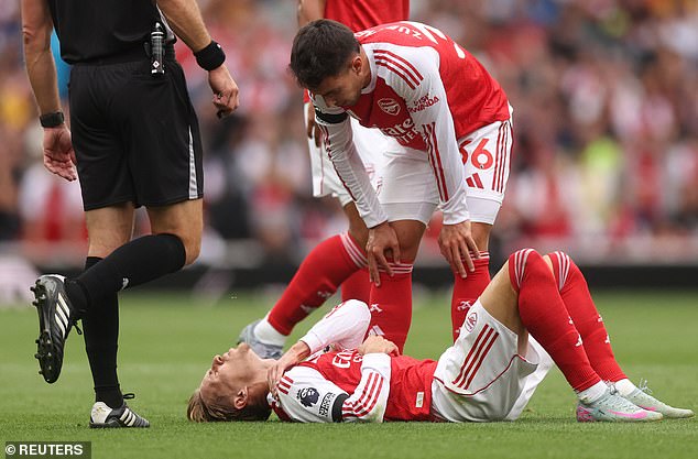 Martin Odegaard was clutching his right shoulder during the first half against Leeds United