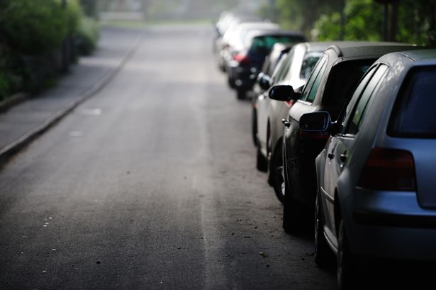 The neighbour tried to reserve a parking spot on the street (stock)