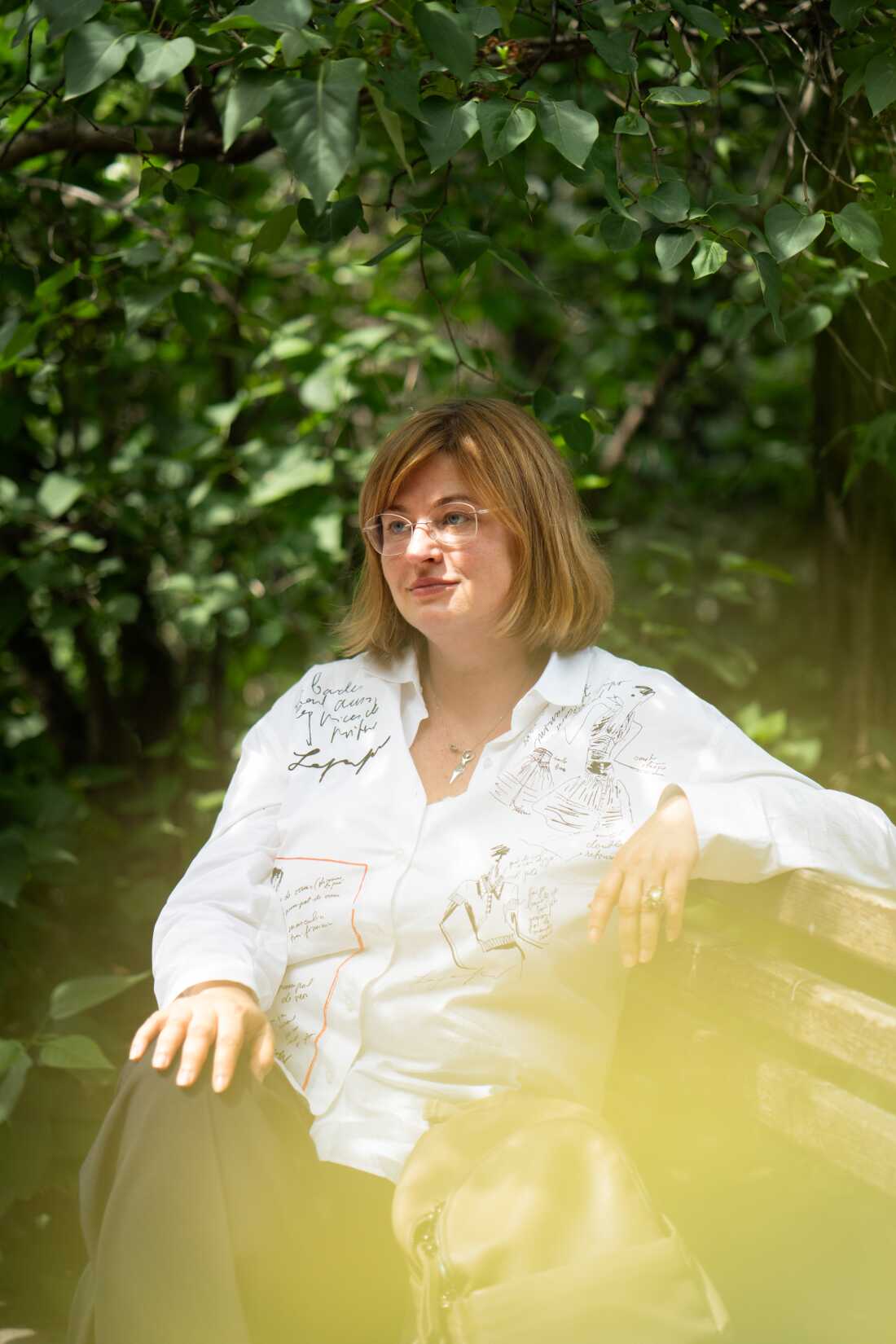 Iryna Schestova sits on a park bench in central Kyiv, Ukraine.