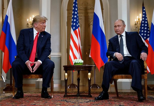 Russian President Vladimir Putin (R) and US President Donald Trump are pictured before a meeting in Helsinki, on July 16, 2018. Putin told his US counterpart Donald Trump in a phone call on February 12, 2025