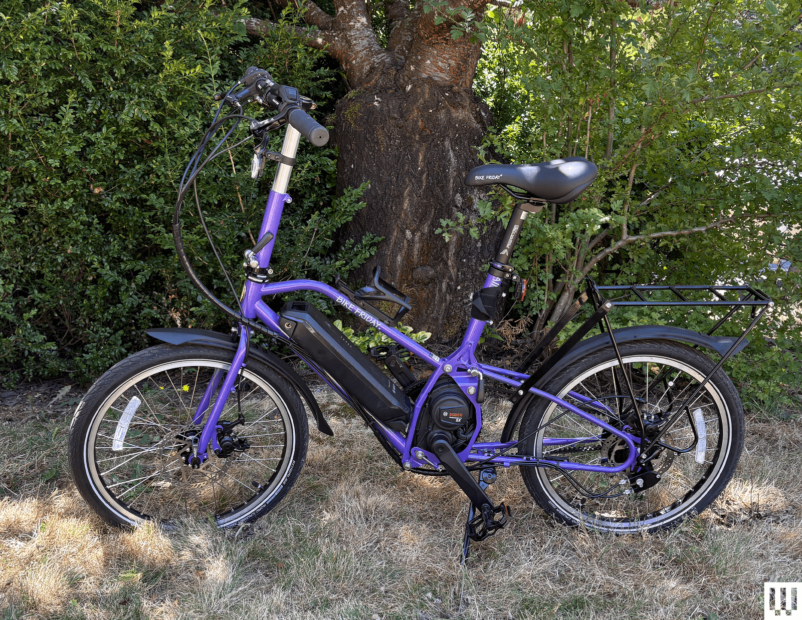 Image may contain Bicycle Transportation Vehicle Machine Spoke Plant and Tree