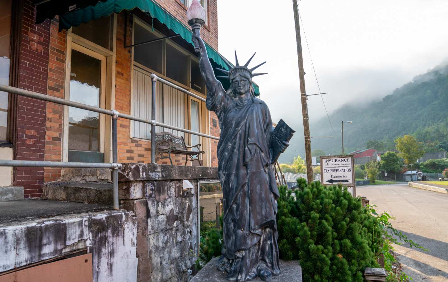 A model of the Statue of Liberty stands on a pedestal August 29, 2022 in Matewan, West Virginia.