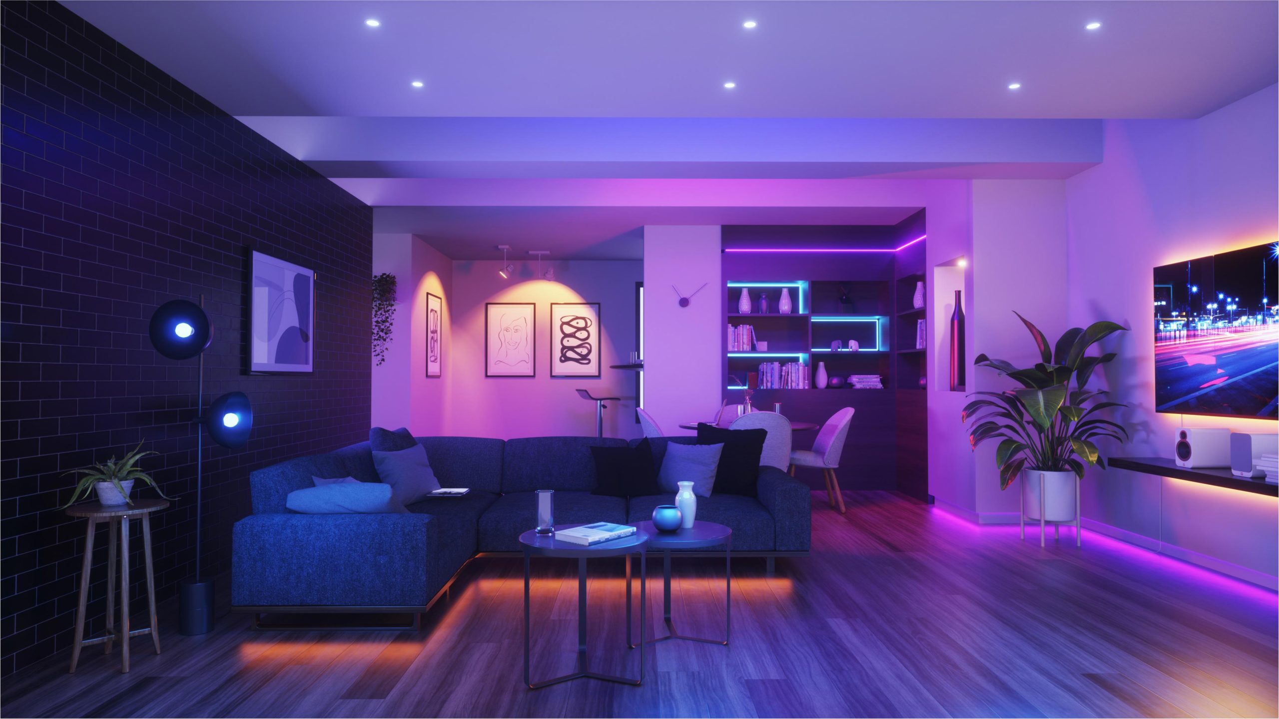 Philips Hue lightstrips under furniture, along walls and around a TV in a living room