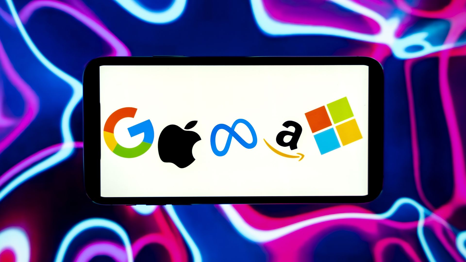 In this photo illustration, the big tech companies Google, Apple, Meta, Amazon and Microsoft logos are seen displayed on a mobile phone screen.