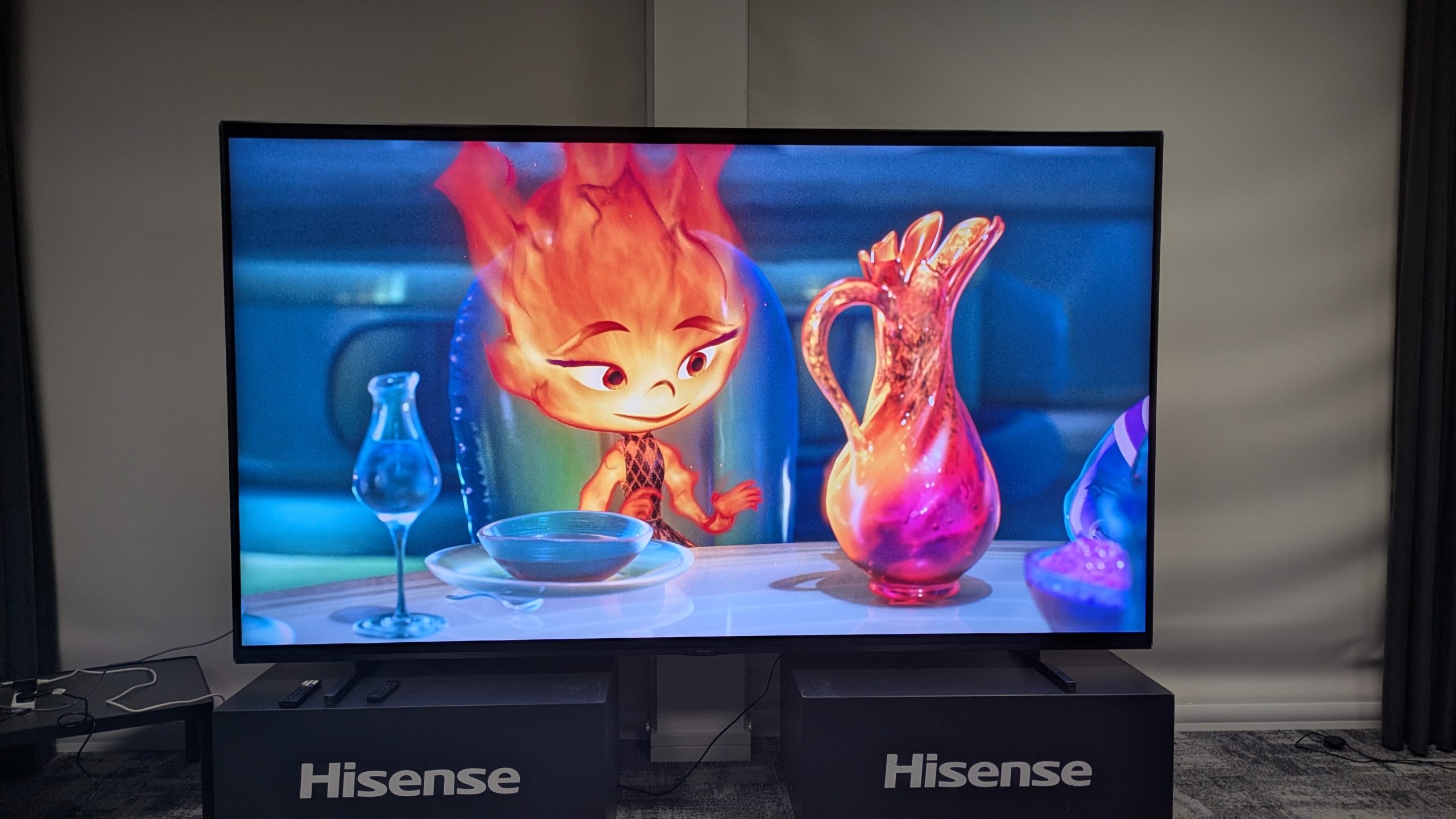 Hisense 116-inch UX RGB mini-LED TV displaying Ember from Elemental with a glass vase