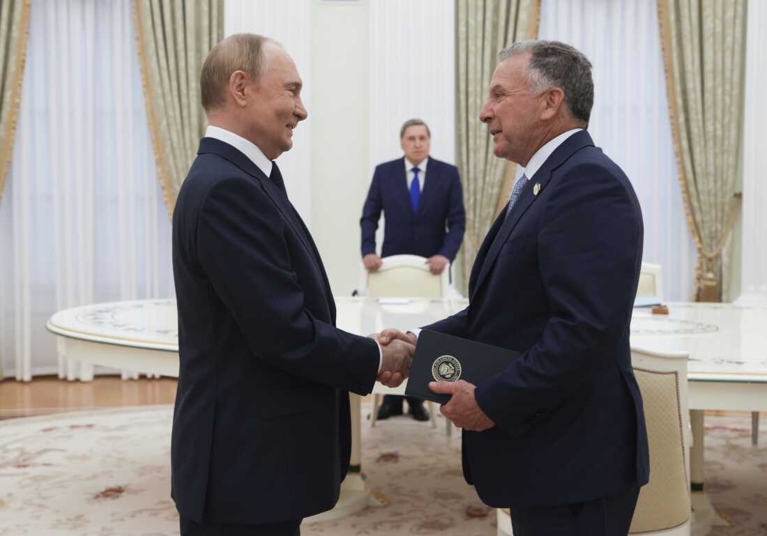 Russian President Vladimir Putin (left) and U.S. special envoy Steve Witkoff shake hands during their meeting in Moscow, Wednesday.