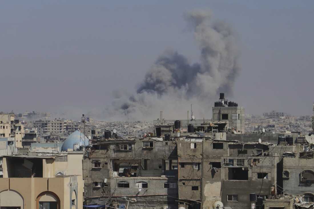 Smoke rises to the sky following an Israeli army airstrike in Khan Younis in the Gaza Strip on Aug. 18, 2025.