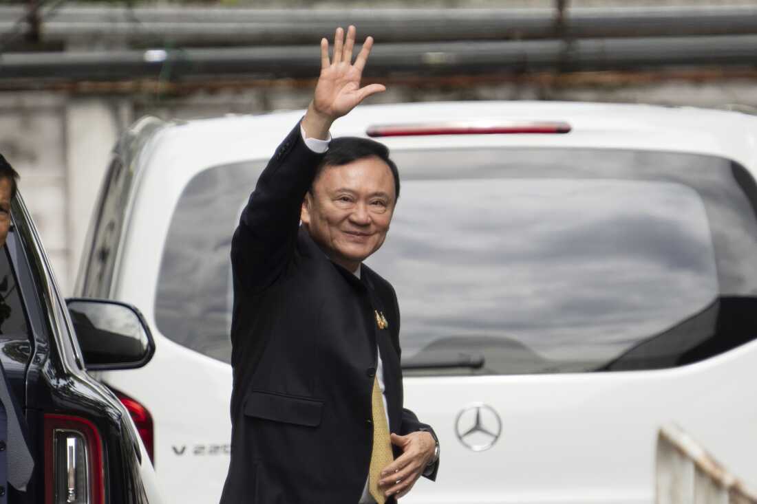 Former Thai Prime Minister Thaksin Shinawatra arrives at Criminal Court for a verdict for allegedly defaming the monarchy in Bangkok on Friday, Aug. 22, 2025.