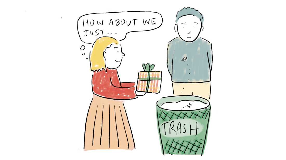 A person taking a gift and throwing it in the trash. 