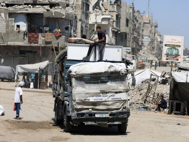 displaced palestinians ride on a vehicle loaded with belongings as they flee from one area to another within gaza city amid an israeli military operation in gaza city august 29 2025 photo reuters