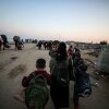Displaced Palestinians making their way back on foot from the southern regions to their homes in the north via Al Rashid Road after the ceasefire agreement in Gaza Strip on January 28, 2025.