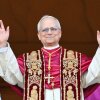 Pope Leo XIV arrives on the balcony of St. Peter's Basilica for the first time since he was elected pope.