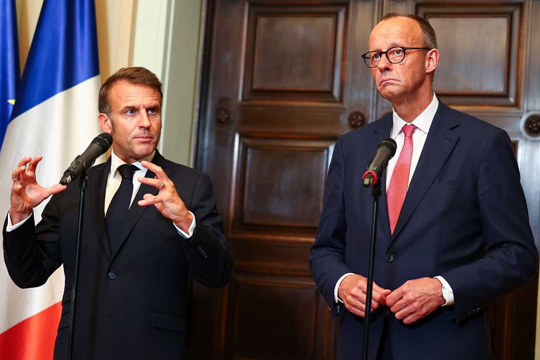 German Chancellor Friedrich Merz and French President Emmanuel Macron talk to media prior to talks at Villa Borsig on July 23 in Berlin.