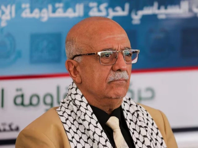 head of the houthi led government ahmad al rahawi looks on during a visit by houthi government officials to the hamas office in sanaa yemen august 19 2024 photo reuters