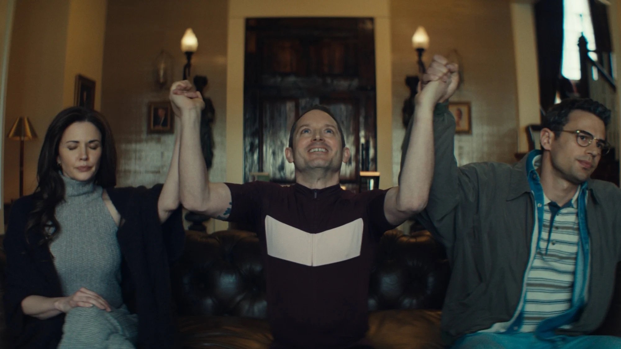 Theo James, Tatiana Maslany, and Elijah Wood in