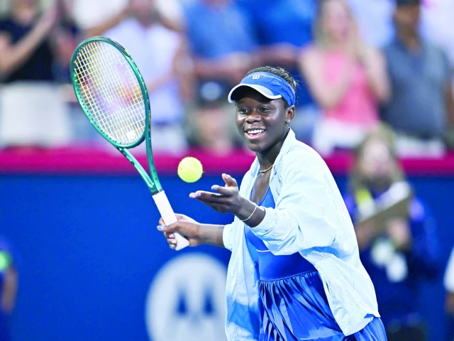 victoria mboko celebrates a victory against coco gauff during their fourth round singles match of the wta 1000 national bank open at iga stadium photo getty afp