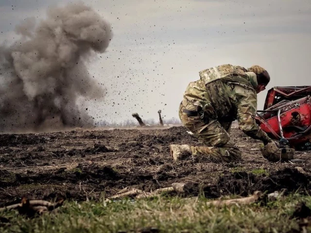 1 3 ukrainian serviceman reacts as he throws a grenade during a training amid russia s invasion of ukraine in donbas region ukraine april 8 2023 reuters