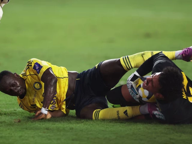 caption al nassr s sadio mane in action with al ittihad s hamed al shanqiti photo reuters