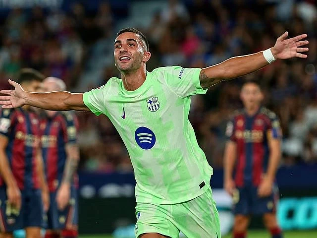 barcelona s ferran torres reacts after scoring during the la liga soccer match between levante and barcelona in valencia spain photo afp
