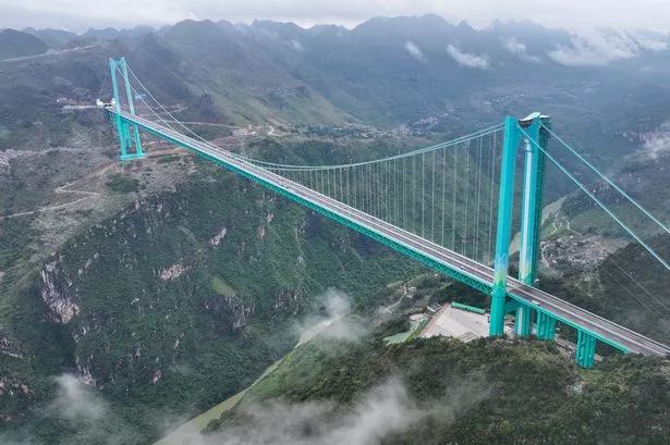 The vast Huajiang Grand Canyon Bridge has opened in China