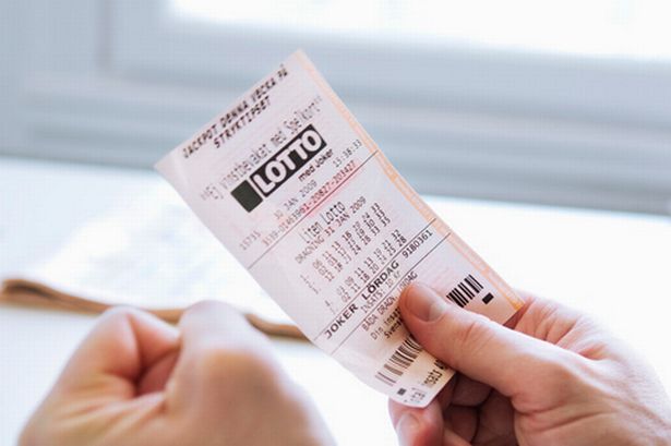 Man with lottery ticket
