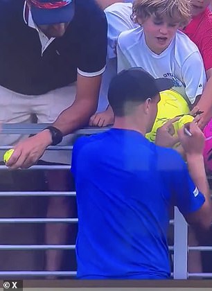 Piotr Szczerek, the millionaire CEO of paving stone company Drogbruk who snatched a hat away from a boy after Kamil Majchrzak passed it into the crowd.
