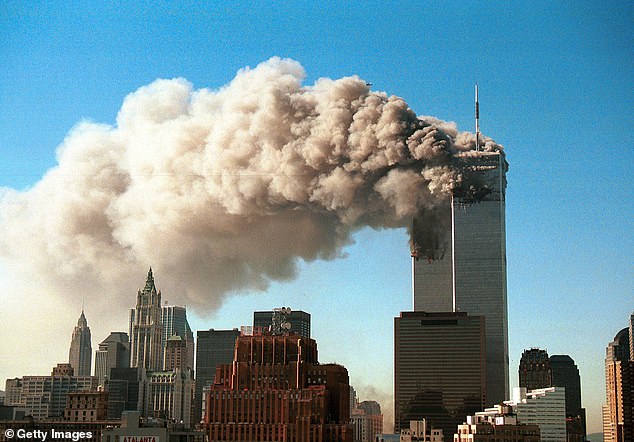 Smoke poured from the Twin Towers of the World Trade Center after they were hit by two hijacked airliners in a terrorist attack September 11, 2001 in New York City