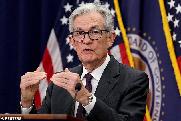 Decision time: A rise in the number of Americans filing for unemployment benefits has increased pressure on Fed chief Jerome Powell (pictured) to cut interest rates next month