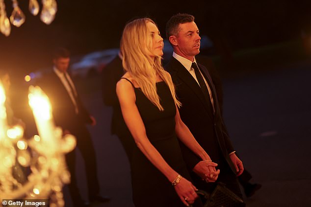Rory McIlroy and Erica Stoll McIlroy arrive for the the Ryder Cup Teams