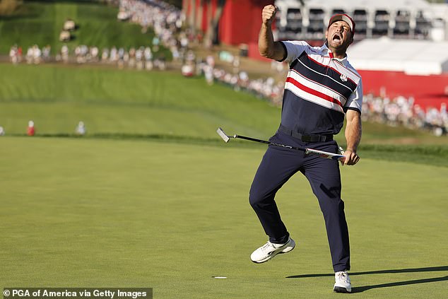 Bryson DeChambeau celebrates his half point against Europe