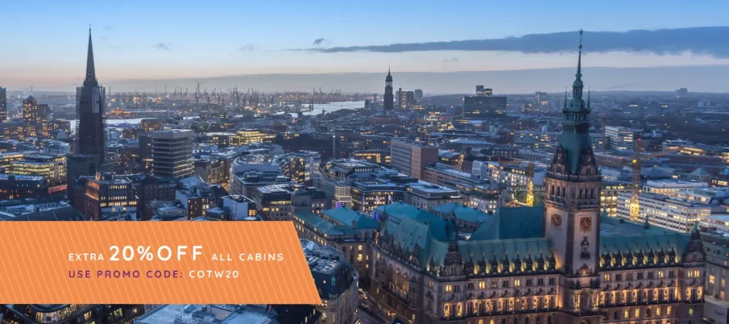 A picture of the Hamburg skyline promoting January cruise deals from Ambassador Cruises