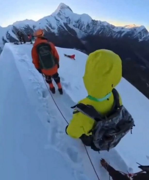 Video grab of mountaineer falling