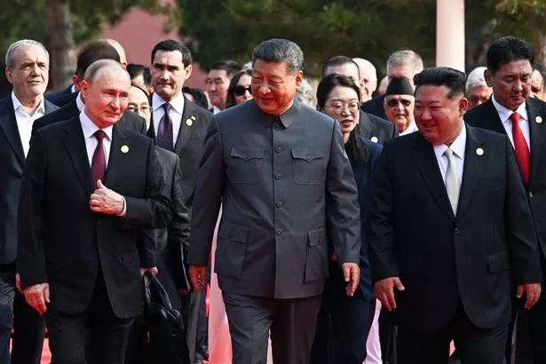 Putin was seen grinning with China