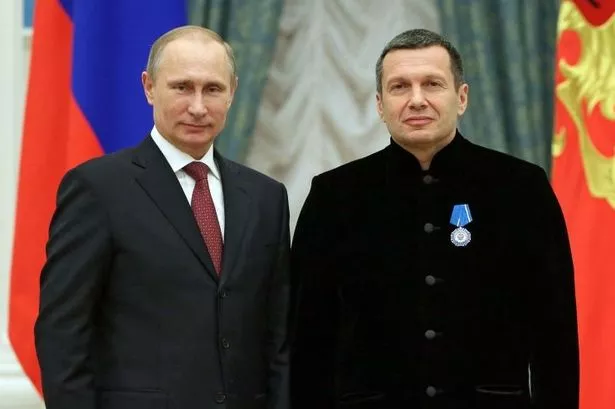 Kremlin stooge Vladimir Solovyov with Putin